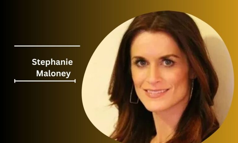 Stephanie Maloney, a marketing professional and wife of podcaster Dan "Big Cat" Katz, smiling outdoors.