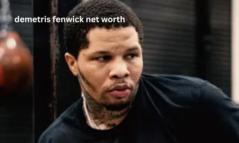 "Professional boxer and coach Demetris Fenwick smiling in a headshot."