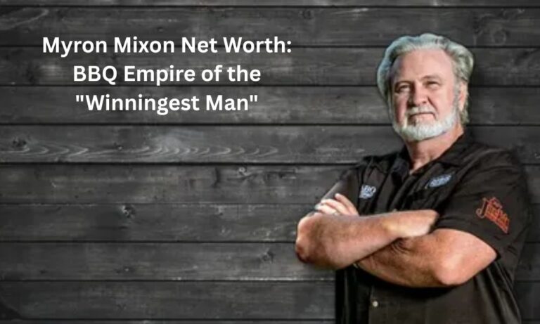 Myron Mixon, champion pitmaster in a white cowboy hat, smiling proudly next to a trophy and a smoker full of barbecue.